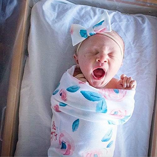 Новороденче кое примаше ќебе со глава поставена бебешка памук, памук, ковчег, цвеќе, бебе, бебе, заспано завиткано завиткање