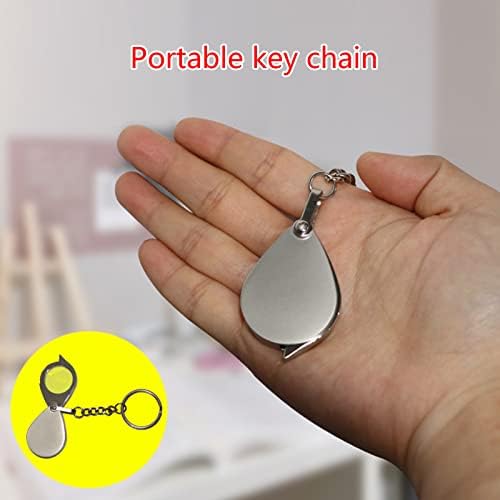 20x мал џеб Зголемување стакло преклопување мини лупа со ланец на клучеви се применува за читање на клуч за клучеви за лулање за накит за наука