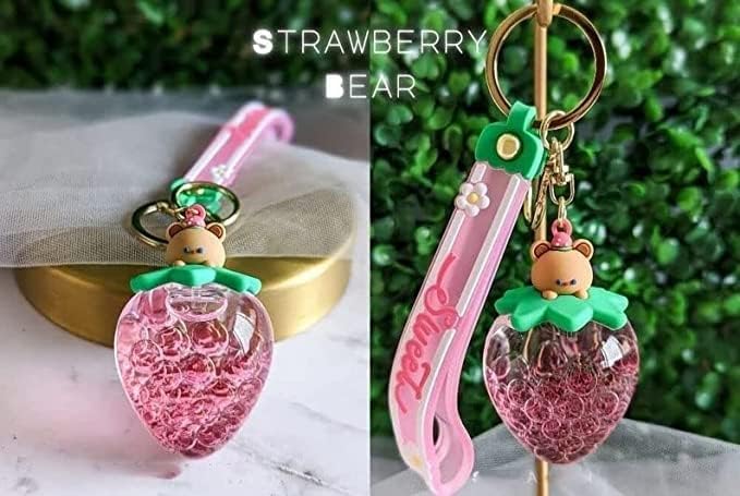 Јагода плови течна приврзок за клучеви, симпатична играчка со розова анксиозност, цветна мечка со каваи, фиџет Шакер, овошен